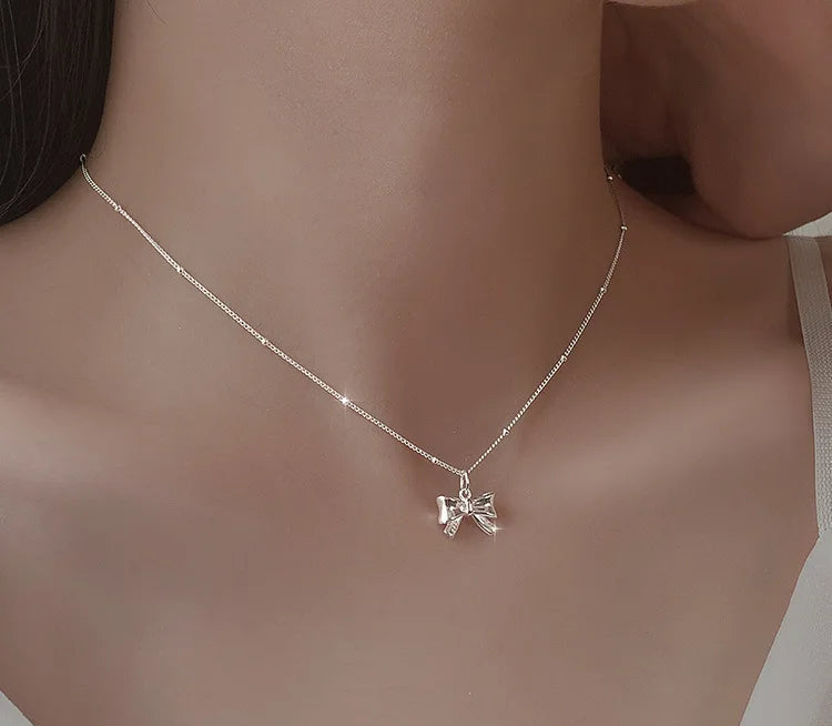 Silberne Schleife Halskette – Silberne Eleganz in Schleifenform