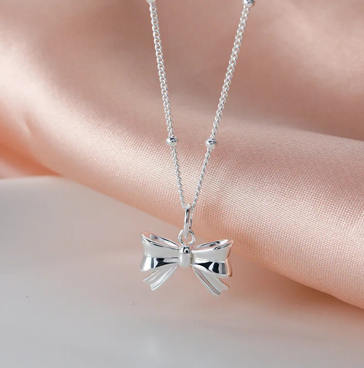 Silberne Schleife Halskette – Silberne Eleganz in Schleifenform