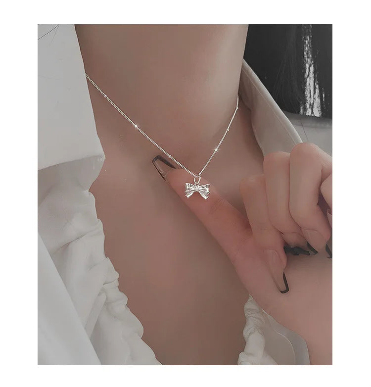 Silberne Schleife Halskette – Silberne Eleganz in Schleifenform